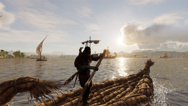 Bayek en una barquita típica de Egipto recorriendo el río Nilo